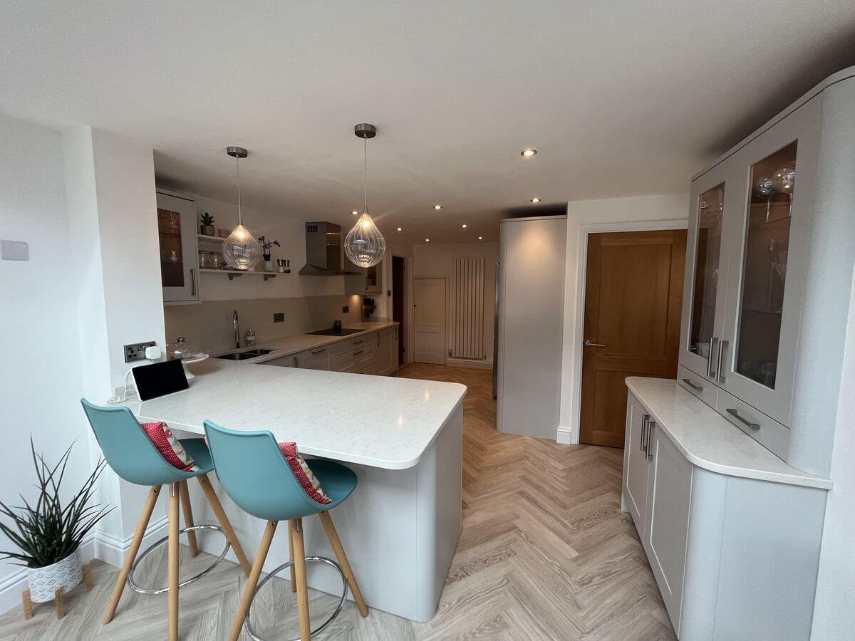 Kitchen installation with island seating area