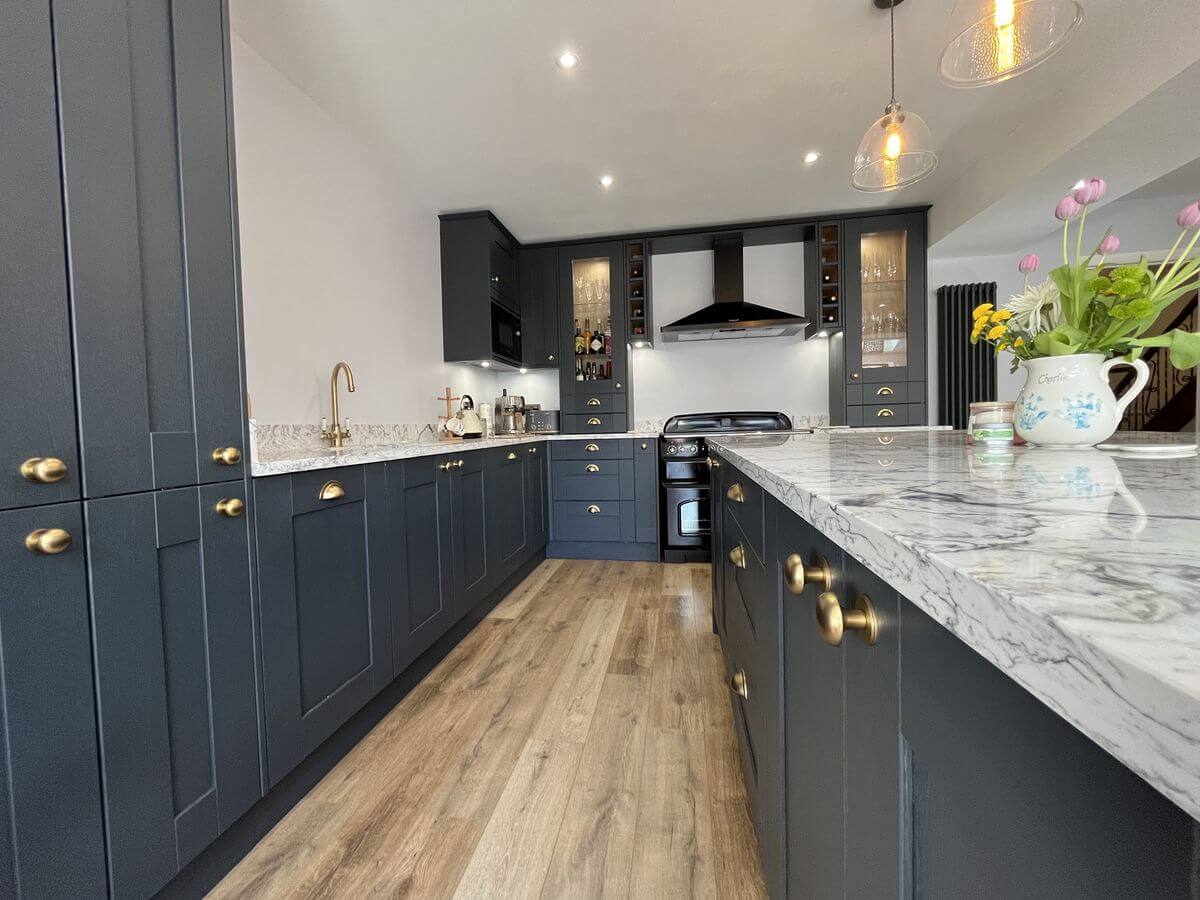 Shaker style kitchen with marble worktops