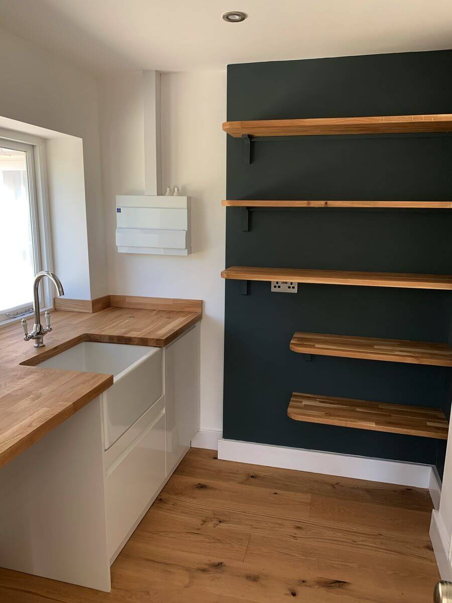 Kitchen utility room with built in shelving